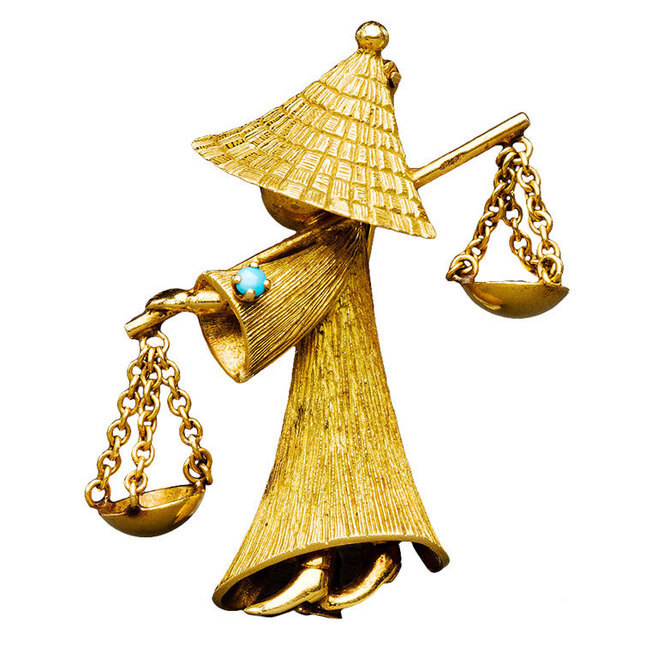 French Gold Peking Figure Brooch, 1950s – Marie E. Betteley
The Chinese full-length figure with a textured robe and peaked hat in 18k gold, enhanced with a small turquoise, balancing two small bowls suspended from chains. Circa 1950s