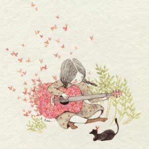 小女孩在弹吉他，和猫。