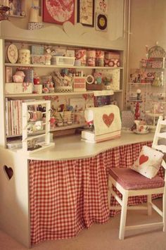 Sewing Room. Sew many pretty and useful ideas here. Nice sewing space,
hidden storage, pretty containers...