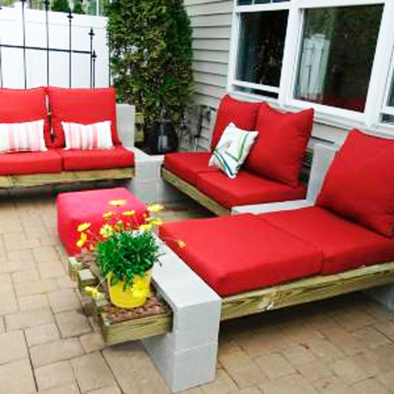 Using only cement blocks, 4x4s, and cushions, she created a U-shap lounge area. “It’s comfortable and beautiful with the all the textures -- wood, concrete and cloth. It’s way versatile when I change my mind. No rotting, no staining, and not one cut needed to make it work!” she says.: