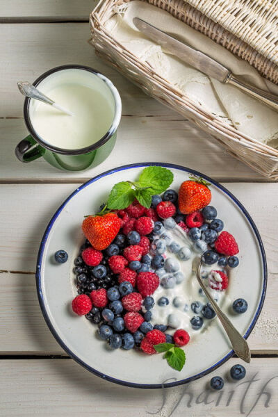 Berry fruits with cream.