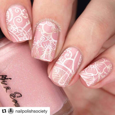 So chic. This gorgeous stamped mani is by the lovely @nailpolishsociety ・・・ Another soft and feminine design ❤. I used @nvrenuffpolish Blushing Bride for my base color and stamped with the @uberch…