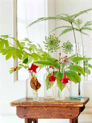 Just One, Please There's virtually no arranging to do when you divide a bouquet into single stems and place them in a collection of bottles or glasses. --To create a pleasing skyline, vary container height and stem length. --Here, a small coleus leaf in a tiny bottle is the lowest element in the ar…