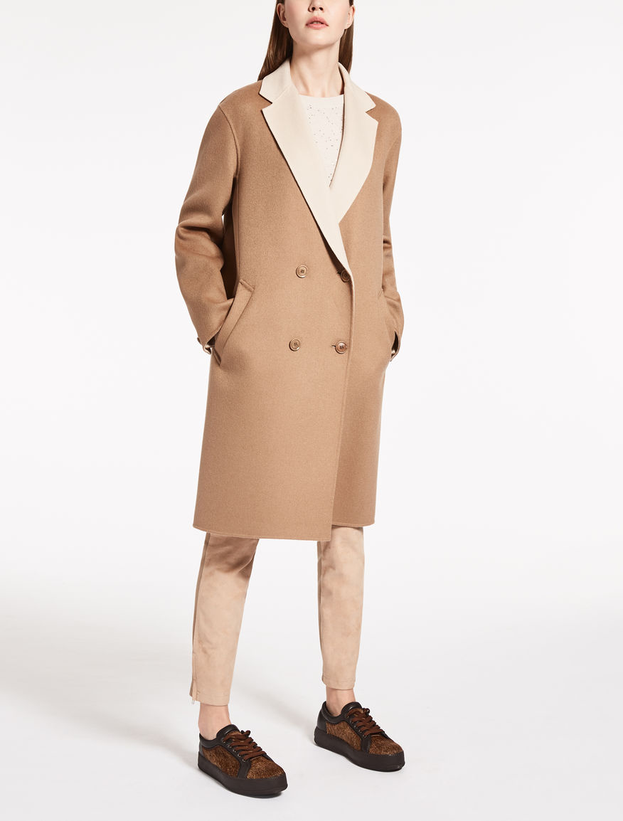 MaxMara/Wool and cashmere coat
※ Details: Egg-shaped jacket in double wool and cashmere fabric. Lapel and piped pockets. Double-breasted button fastening.
※ Composition: 90% virgin wool, 10% cashmere.