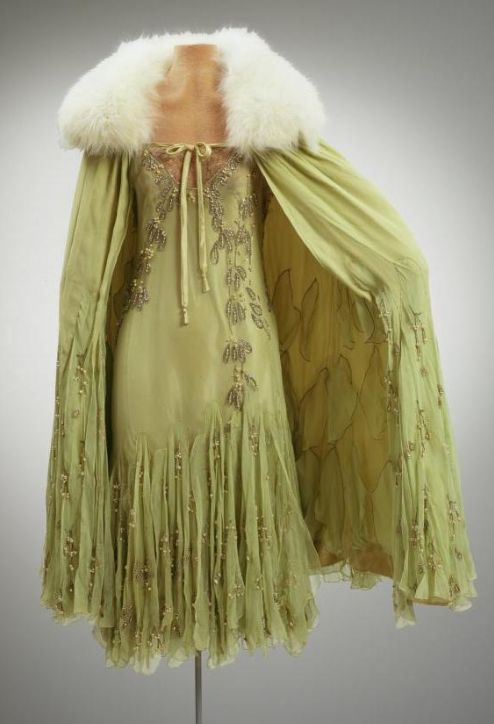 1927 Dress is of sheer green silk chiffon with narrow shoulder straps and a flared skirt. Chartreuse beaded outfit suit formal designer 2 pc cape.