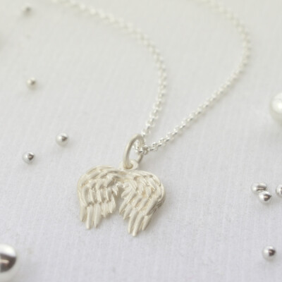 Lily Charmed angel wing pendant