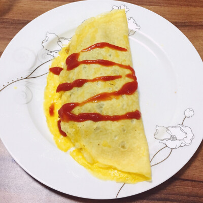 美味的蛋包饭～里面的米饭是咖喱土豆焖饭ʕ •ᴥ•ʔ珊哥吃了整整一盘