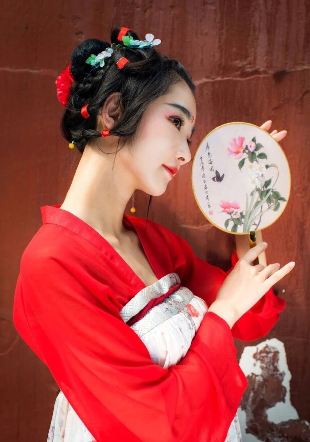 又寄百尺彩.绯红相盛衰。