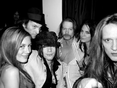 Band guys and girls.Axl and Bach.