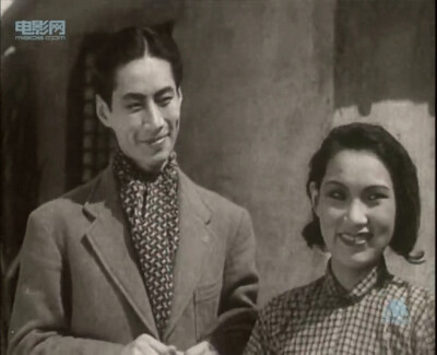 在1937年的《青年进行曲》扮演女工金娣...