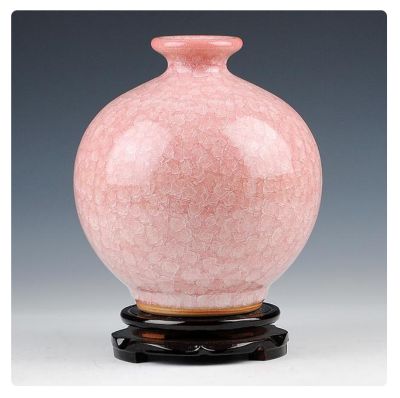 仿古冰片裂纹釉花瓶
高温烧制纯手工制作，官窑裂纹釉花造型，瓷质细腻通透，手感顺滑，完美无瑕疵，点缀爱家不单调。