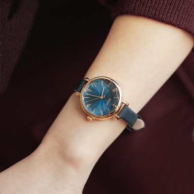 聚利时同款蓝色韩国时尚圆形皮带切割面女生手表简约气质石英女表