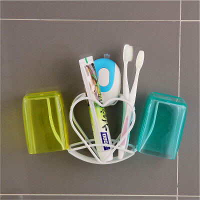 欧润哲吸壁式椭圆吸盘心形牙刷架创意浴室壁挂牙膏架漱口杯架套装