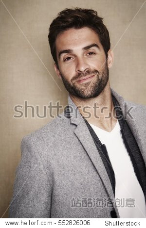 Portrait in grey coat of smiling model
