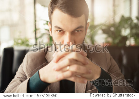 Confident businessman portrait - stern look