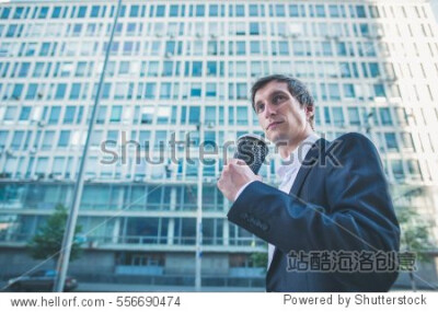 Businessman drink coffee cup. Business male, man. Adult white person. Young people lifestyle. Sitting success serious manager in suit thinking. Coffee brake.