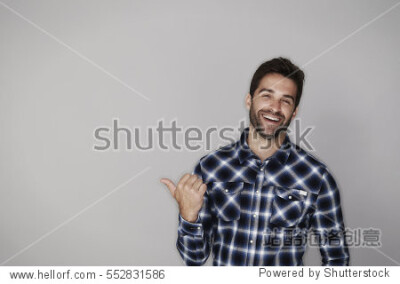 Laughing guy in checked shirt, portrait