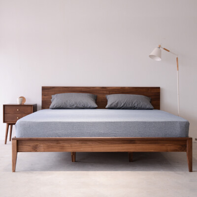北欧全黑胡桃木实木床双人1.8米1.5简约小户型卧室家具日式双人床