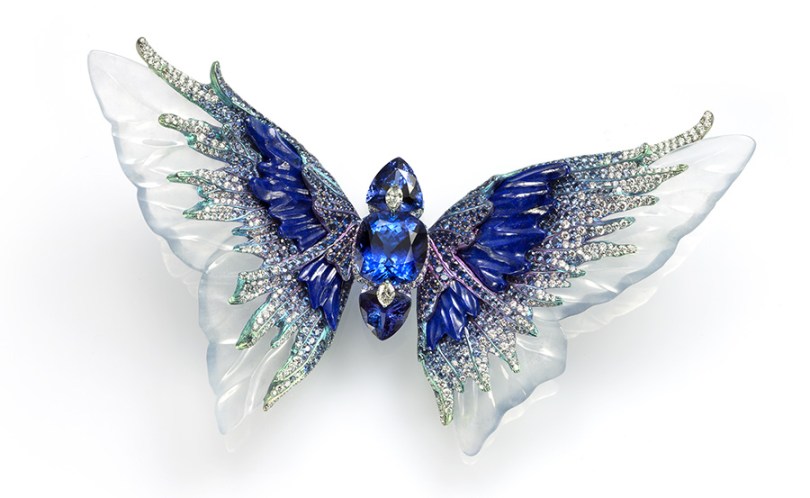 Whimsical Blue - the body is made up of three tanzanites set with diamonds, and the wings consist of carved icy jadeite, lapis lazuli and sapphire.