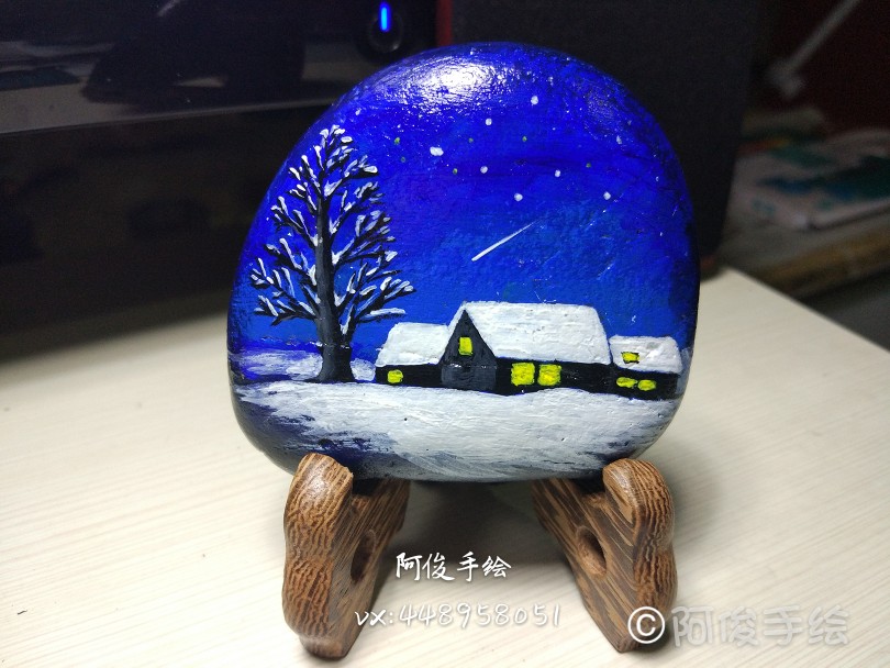 手绘石头画《雪乡》