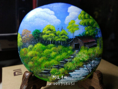 手绘石头画《丛林小屋》