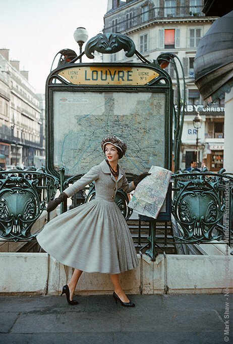 Grey Dior Outside Paris Louvre Metro, 1957. This image of a model wearing a gray Dior suit outside the Louvre Metro station was photographed by Mark Shaw in Paris in 1957 for LIFE magazine's September article