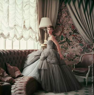 Sophie Malgat wears Dior in Dior’s Passy Home, 1953. Sophie Malgat in Gray Chiffon Dior in Dior’s Paris Home. Outtake from a shoot for Life Nov. 9, 1953 issue. Mark Shaw’s camera captured this Dior…