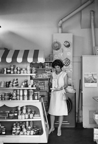 An unusual shot, taken in Georgetown in 1959, shows Jackie in a grocery store. The source for this image was a vintage 35mm black and white negative.