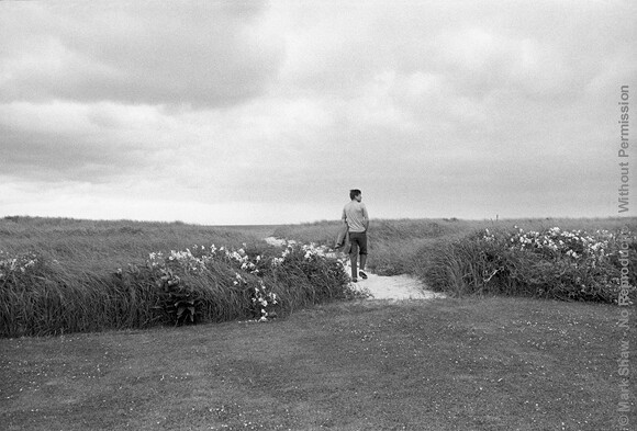 JFK’s favorite photo of himself was taken by Mark Shaw in 1959 on the dunes near Hyannis Port. This photo has been used frequently, since JFK’s assassination, to symbolize his presidency. The source for this image was a vintage 35mm black and white negative.