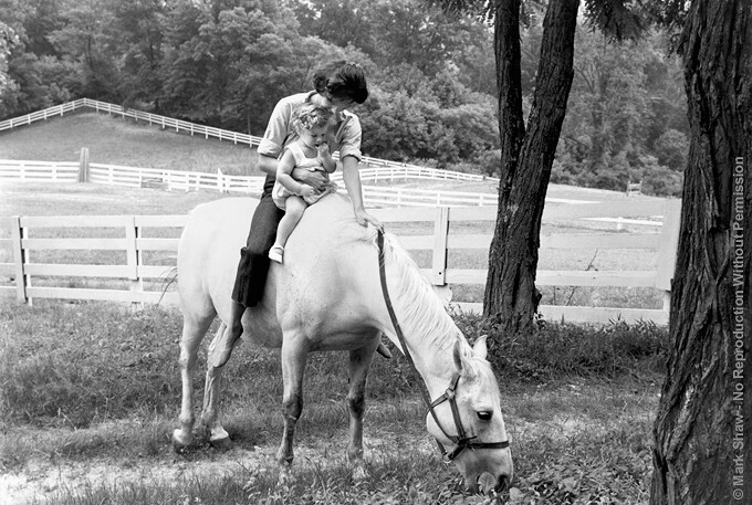 Jackie and Caroline Kennedy photographed for LIFE magazine are pictured bareback atop Sagebrush at Jackie's mother's Virginia estate, Merrywood in 1959. Jackie had been riding since childhood and was considered both a natural and an expert horsewoman. This image is also part of the Mark Shaw Photogr