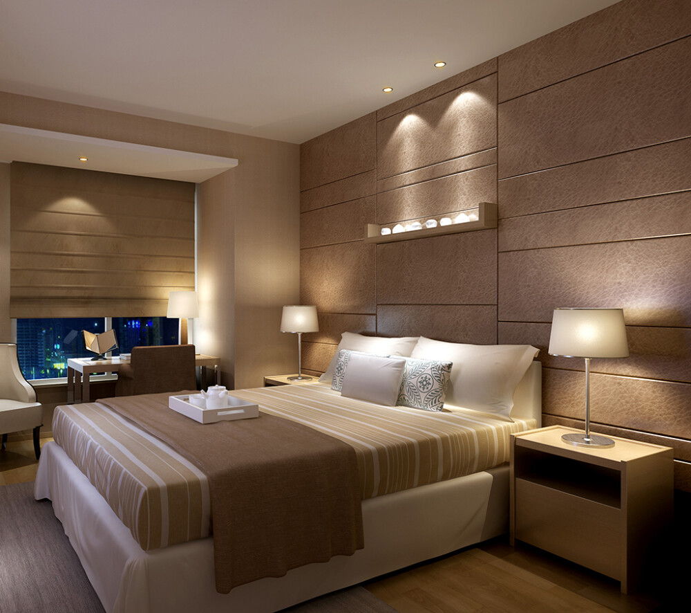  本案在各个不同的功能区域之间或隔断或隔而不断，保证了空间的交流，又互不干扰。客厅被分为会客和就餐区，通过顶部的不同装饰和地面铺设的变化区分开来。客厅电视墙比较有意思，采用玻璃和皮纹砖相结合，既晶莹剔透又富有层次感。餐厅的空间比较狭小，设计师在一侧安置了银镜与不锈钢结合的装饰酒柜，满足了餐厅的功能的同时又在视觉上拓展了空间。