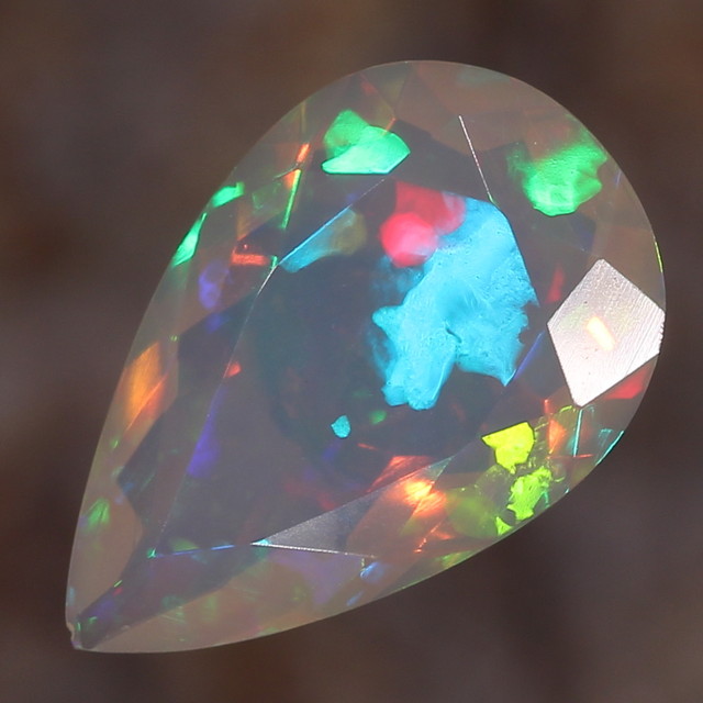 2.16ct. Faceted. Superior Confetti Opal.