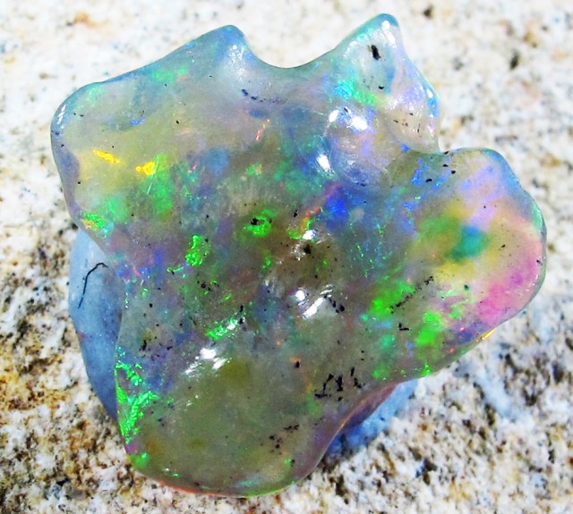 4.98 CtsWild Unique hand polished carved opal QOM 1474