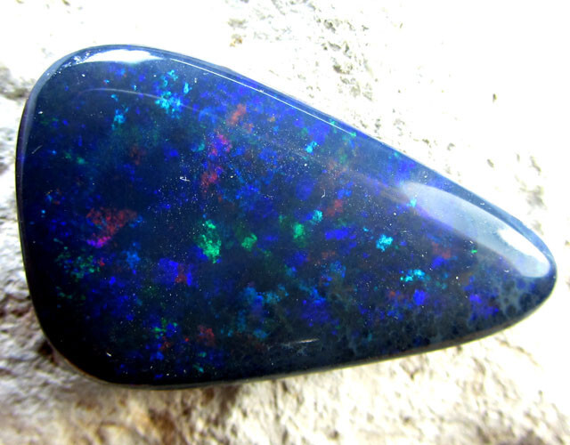 EXQUISITE BLACK OPAL 40.20 CARATS AA9