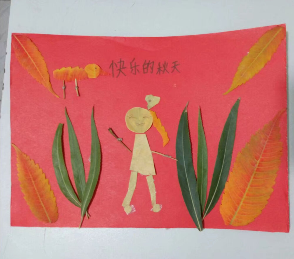 树叶剪贴画，吃面条的小孩