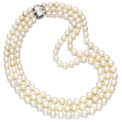 Natural pearl and diamond necklace
Composed of three rows of graduated natural pearls measuring from approximately 6.5 to 9.1mm, to a clasp set with circular- and single-cut diamonds, shortest length …