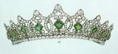 A diamond and emerald tiara given by Henri Orleans of France to his niece Helene. Designed as at least nine interlocking diamond motifs, each with a central emerald, set as a lozenge shape, and topped…