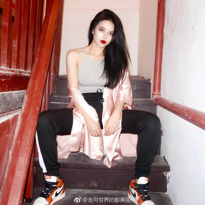 @走向世界的彭美丽