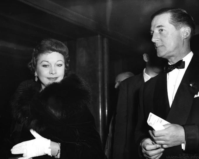 Noel Coward who is celebrating his 59th birthday arrives with Vivien for the first night of Who's your Father at the Cambridge Theatre London in 1958