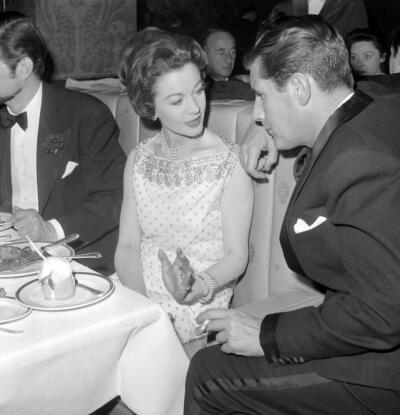 Jack Merivale, Vivien Leigh, and English Director Peter Glenville during a celebration party for Vivien in New York on 21 April 1960.