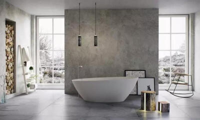 【浴室】
浴室的水泥灰墙面，和浴室用品形成了简约的黑灰白基调，搭配原木的装饰，让人在沐浴之中，感受原始自然的空间。