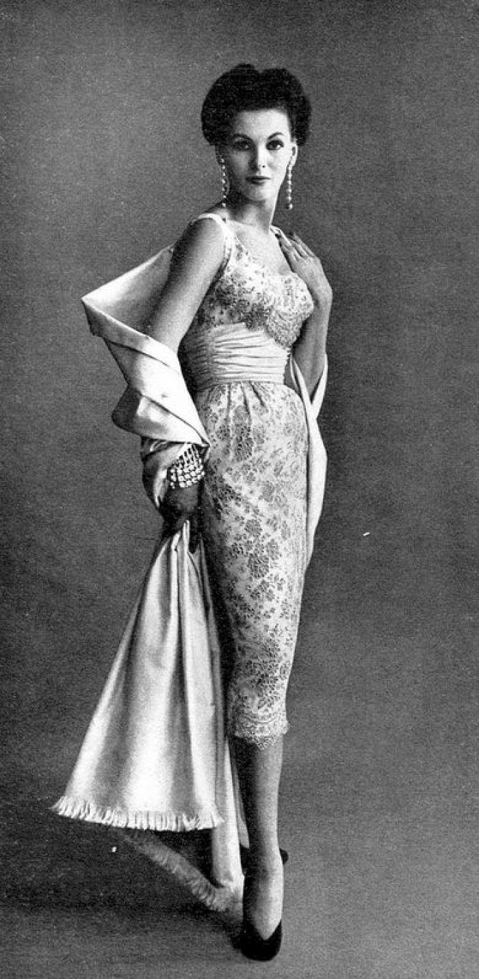 Georgia Hamilton in cocktail dress by Harmay, Vogue 1953