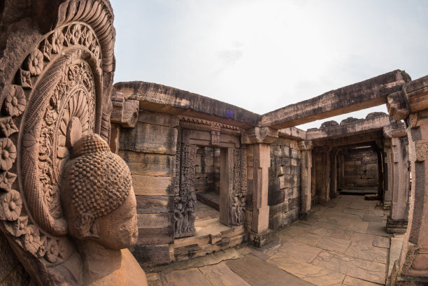 Sanchi Stupa, ancient Buddha statue details, religion mystery, carved stone. Travel destination in Madhya Pradesh, India.