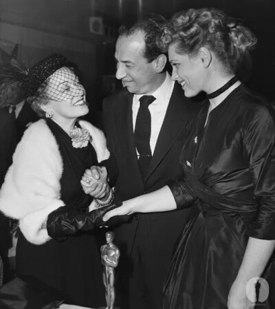 1951 - Presenter Gloria Swanson with Best Actor Jose Ferrer (Cyrano de Bergerac) and Best Actress Judy Holliday (Born Yesterday) at the 23rd Academy Awards.