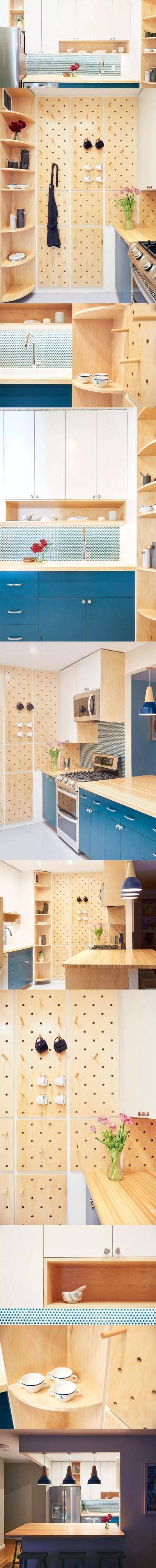 绿色和蓝色点缀着厨房，与木质颜色共同营造出温馨的氛围