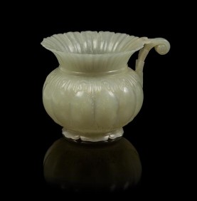 A Mughal-Style Carved Jade Vase，成交价： 6,250 USD （含买家佣金），Leslie Hindman2016年亚洲艺术品春季拍卖会