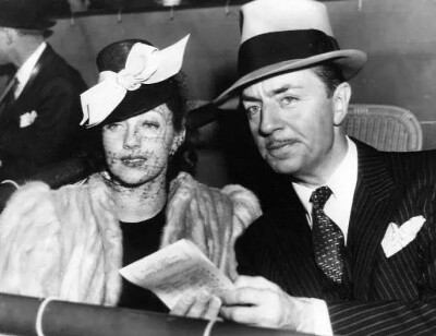 Diana Lewis and William Powell at Santa Anita Racetrack. February, 1940