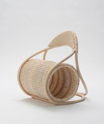 Bobbin Chair : Bobbin ChairEmbracing the characteristics of the material rattan, this chair offers a flexible seat and backrest.​ The continuous curves create a frame for the cylindrical seat, and ke…
