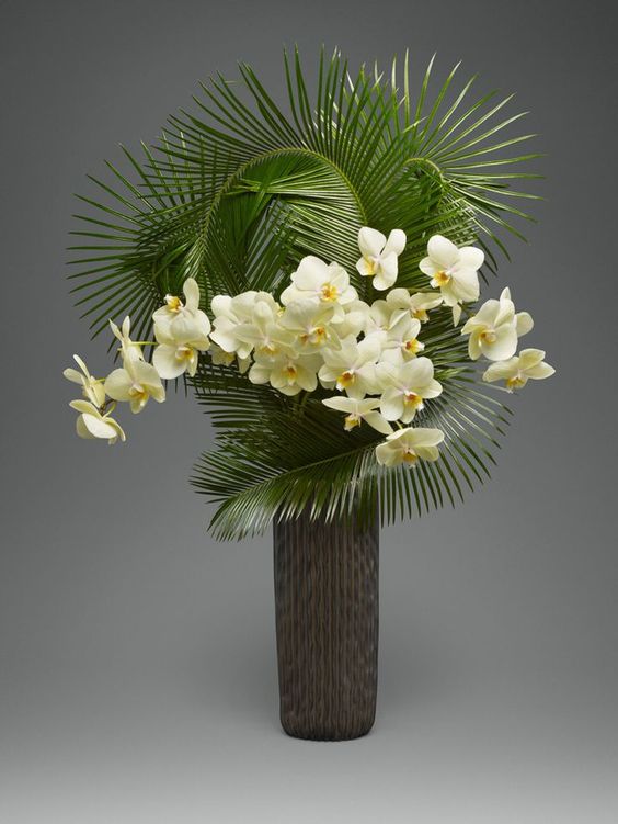 Image result for orchid and palm vase arrangement: 