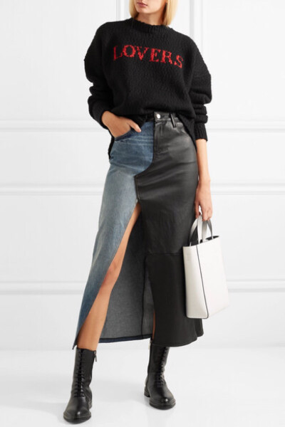 AMIRI 以洛杉矶的摇滚文化为灵感源泉，穿上它就能让你轻松展现酷感风格——不少时尚红人因此成为品牌拥趸，名模 Gigi Hadid 就是其中之一。这款中长半身裙采用蓝色牛仔布和黑色皮革拼接而成，饰有仿旧细节，呈现略微…